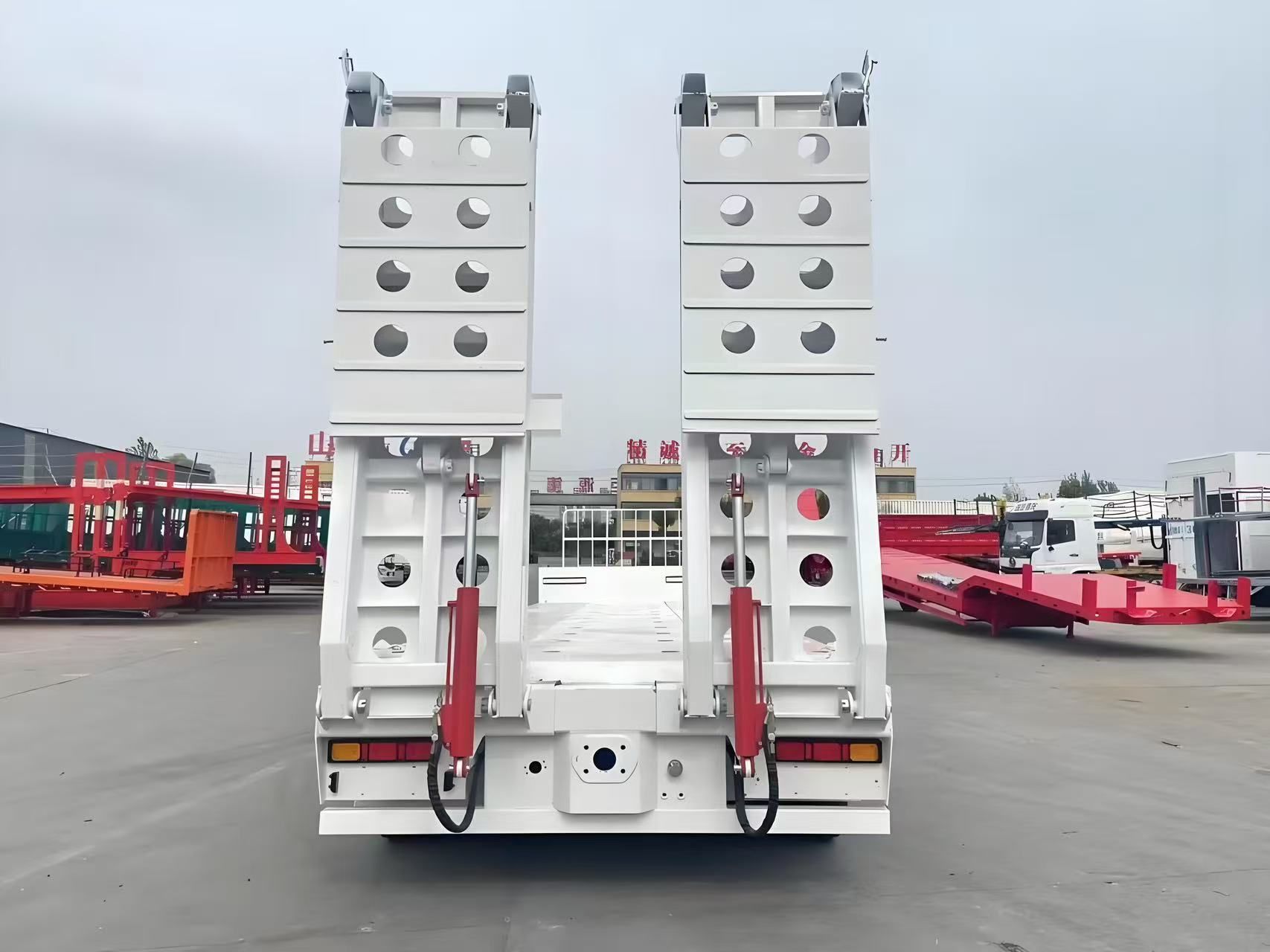 Lowbed equipment trailer ready for excavator loading